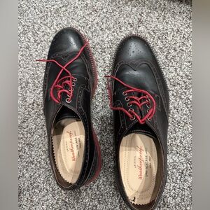 Black dress shoes with red soles size 11.5 M but run slightly small